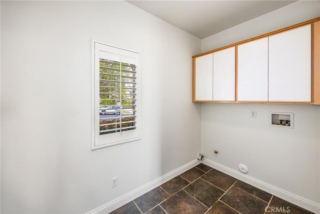 11834 Greenbluff Way, Yucaipa, CA 92399 - washroom featuring cabinet space, baseboards, gas dryer hookup, washer hookup, and dark tile patterned floors