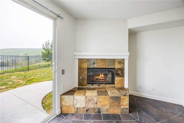 11834 Greenbluff Way, Yucaipa, CA 92399 - detailed view of baseboards and a tile fireplace