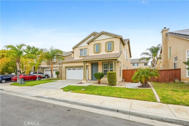 traditional-style house with a garage, stucco siding, fence, a front lawn, and concrete driveway