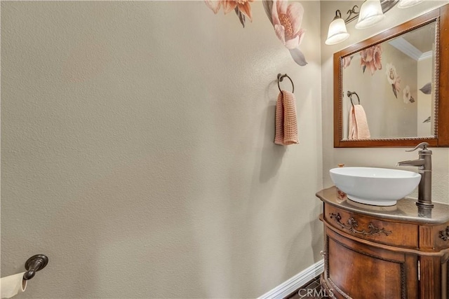 4022 Cocina Ln, Palmdale, CA 93551 - bathroom with vanity, baseboards, and crown molding