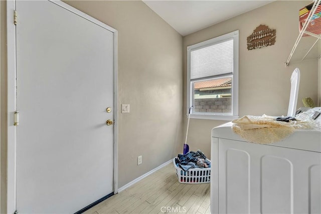 4022 Cocina Ln, Palmdale, CA 93551 - interior space featuring light wood-style flooring, washer and clothes dryer, baseboards, and laundry area