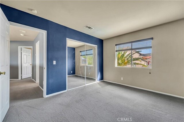 4022 Cocina Ln, Palmdale, CA 93551 - unfurnished bedroom featuring baseboards, visible vents, and carpet floors