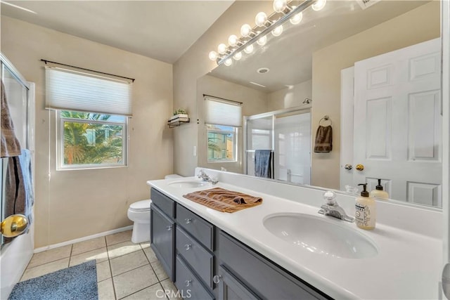 4022 Cocina Ln, Palmdale, CA 93551 - bathroom with toilet, an enclosed shower, a sink, and tile patterned floors