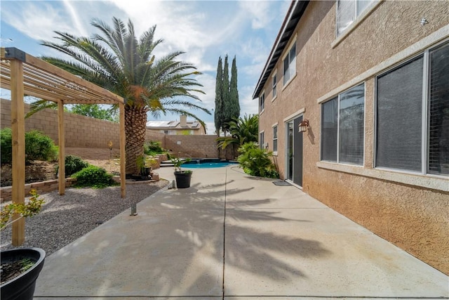 4022 Cocina Ln, Palmdale, CA 93551 - view of patio / terrace with a fenced backyard, a fenced in pool, and a pergola