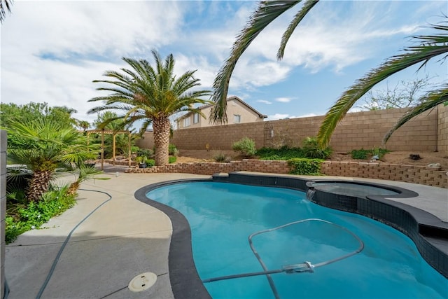 4022 Cocina Ln, Palmdale, CA 93551 - view of swimming pool featuring a pool with connected hot tub, a patio, and a fenced backyard