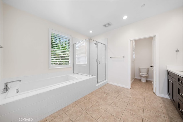 120 Halo, Irvine, CA 92618 - bathroom featuring a bath, a stall shower, toilet, vanity, and tile patterned flooring