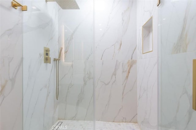 16040 W Sunset Blvd Unit 102, Pacific Palisades, CA 90272 - bathroom with a marble finish shower