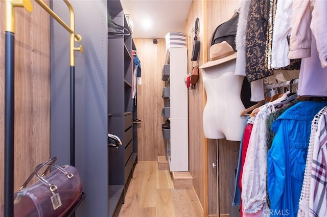 16040 W Sunset Blvd Unit 102, Pacific Palisades, CA 90272 - walk in closet featuring wood finished floors