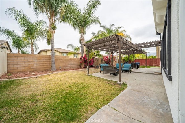 view of yard with a fenced backyard, a pergola, and a patio area