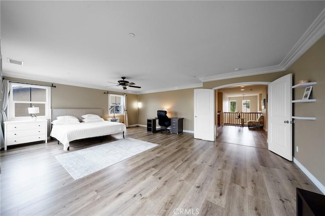 1639 Tivoli St, Redlands, CA 92374 - bedroom with light wood-type flooring, visible vents, baseboards, arched walkways, and ornamental molding