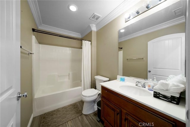bathroom with visible vents, toilet, vanity, and ornamental molding