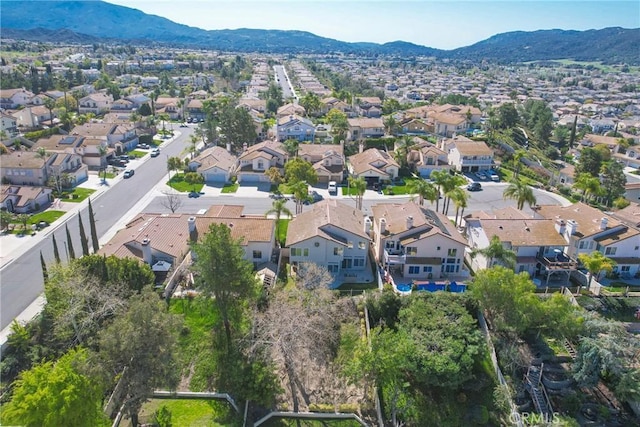 drone / aerial view with a mountain view and a residential view