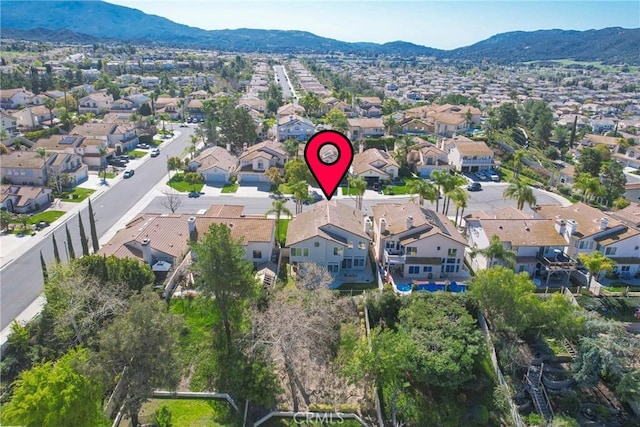 aerial view with a mountain view and a residential view