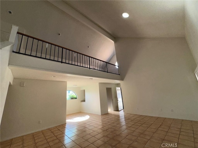 19229 Pine Way, Apple Valley, CA 92308 - unfurnished room with high vaulted ceiling, tile patterned floors, and recessed lighting