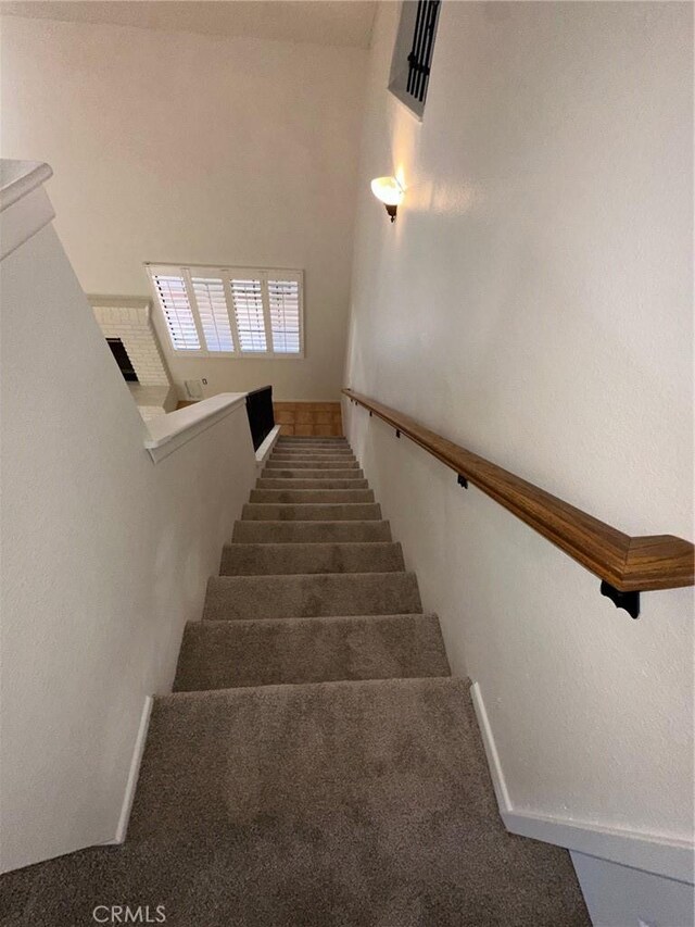 19229 Pine Way, Apple Valley, CA 92308 - stairway with baseboards and carpet