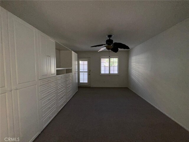19229 Pine Way, Apple Valley, CA 92308 - spare room featuring a ceiling fan and dark colored carpet