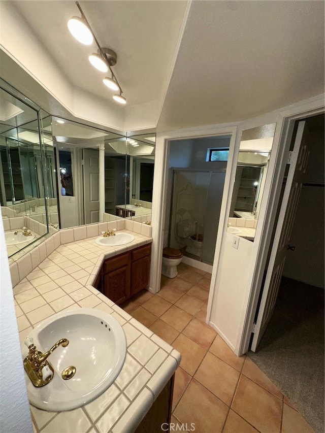 19229 Pine Way, Apple Valley, CA 92308 - bathroom featuring vanity, tile patterned flooring, and toilet