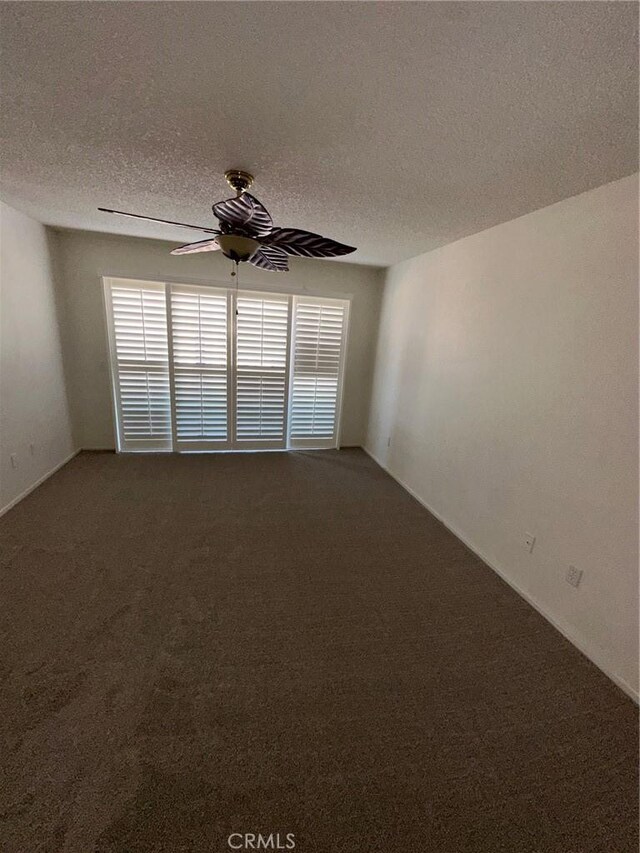 19229 Pine Way, Apple Valley, CA 92308 - empty room featuring carpet, a textured ceiling, a ceiling fan, and baseboards
