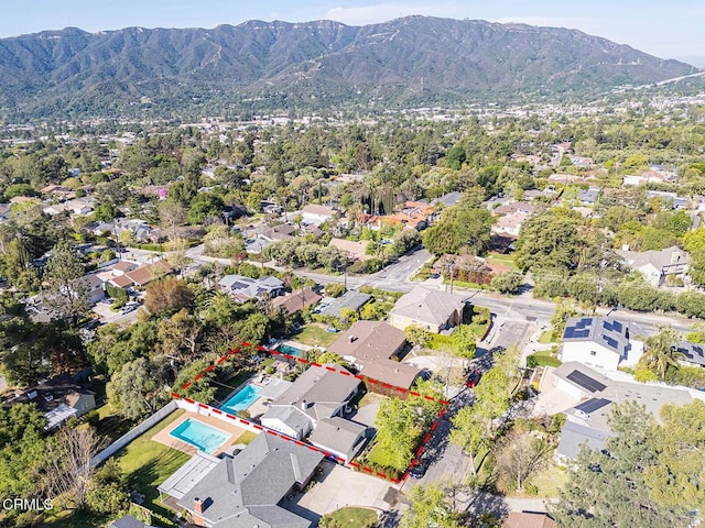 aerial view featuring a mountain view and a residential view