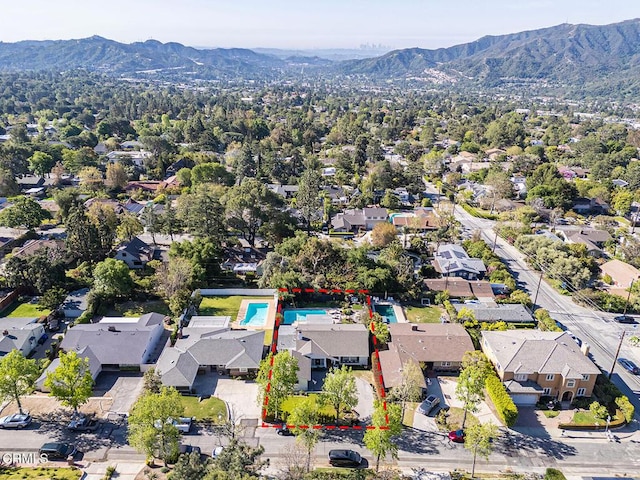drone / aerial view with a residential view and a mountain view