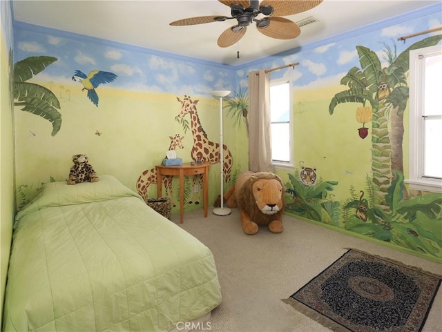 bedroom featuring ceiling fan, visible vents, multiple windows, and carpet floors
