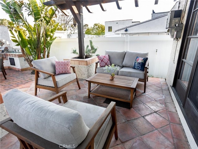 view of patio with a fenced backyard and outdoor lounge area