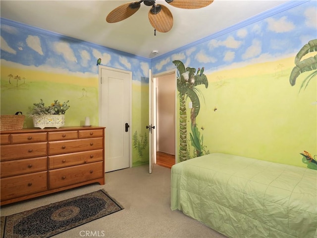 carpeted bedroom with a ceiling fan
