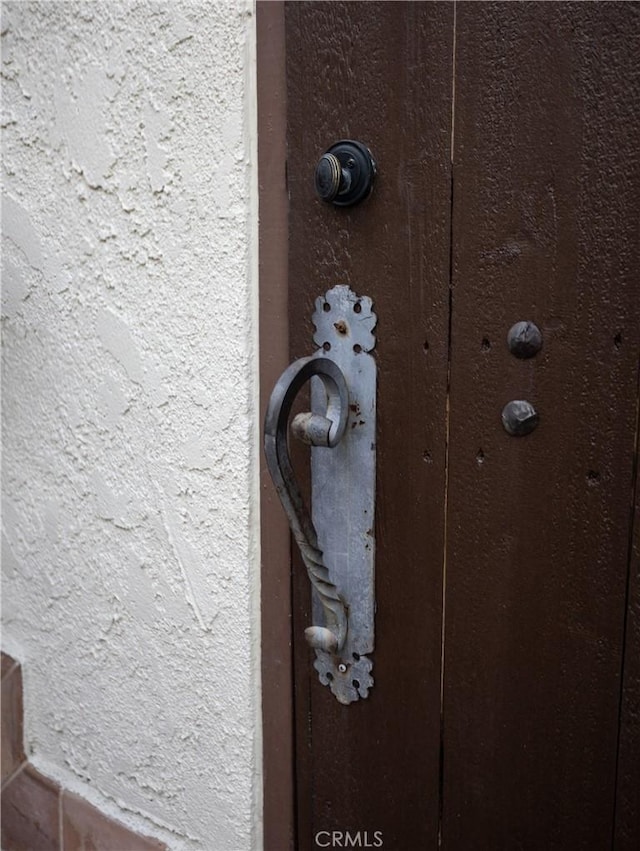 details featuring stucco siding