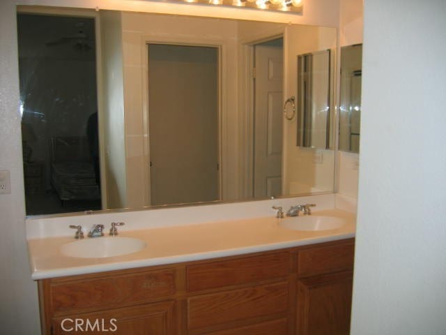 1590 River Wood Ct, Simi Valley, CA 93063 - bathroom featuring double vanity and a sink