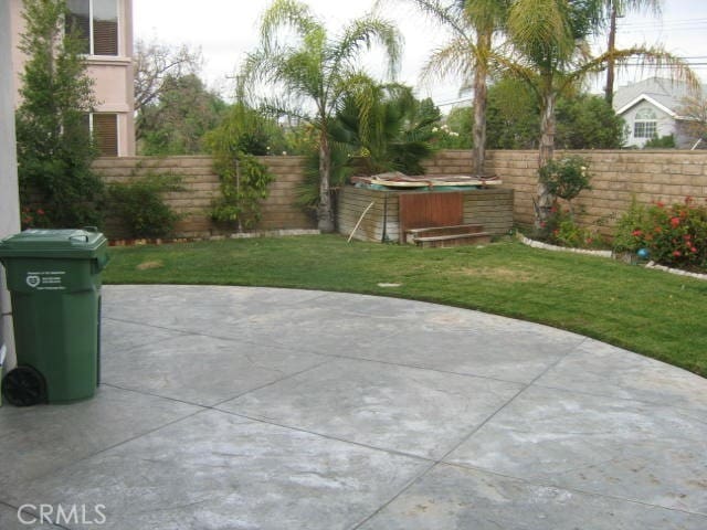 1590 River Wood Ct, Simi Valley, CA 93063 - view of patio / terrace with a fenced backyard and a hot tub
