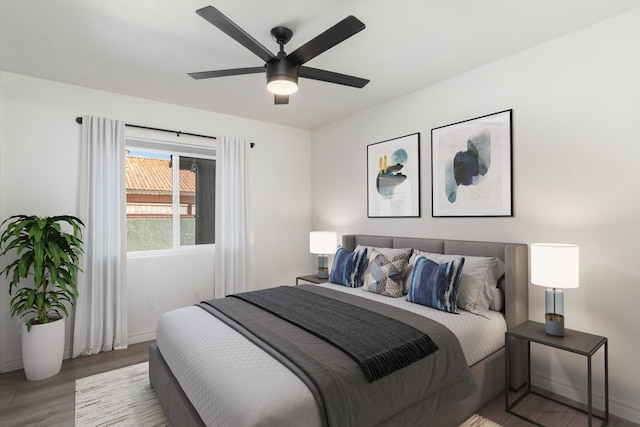 39203 Foxglove Cir, Murrieta, CA 92563 - bedroom featuring baseboards, a ceiling fan, and wood finished floors