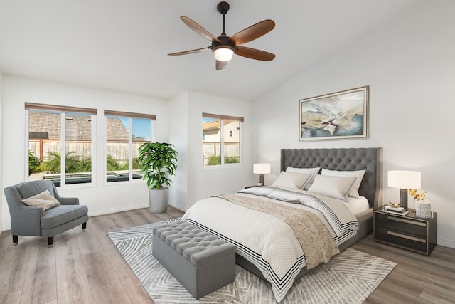 39203 Foxglove Cir, Murrieta, CA 92563 - bedroom with ceiling fan, baseboards, vaulted ceiling, and wood finished floors