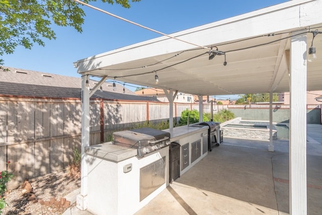 39203 Foxglove Cir, Murrieta, CA 92563 - view of patio / terrace featuring exterior kitchen, fence, and area for grilling