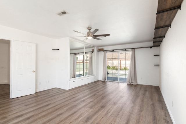 39203 Foxglove Cir, Murrieta, CA 92563 - unfurnished room with visible vents, baseboards, a ceiling fan, and wood finished floors