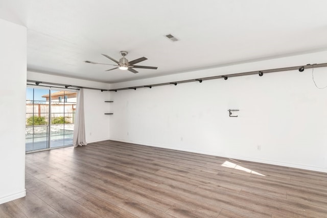 39203 Foxglove Cir, Murrieta, CA 92563 - empty room featuring wood finished floors, ceiling fan, baseboards, and visible vents