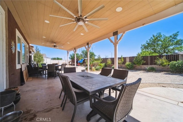 41908 Sonoma Rd, Palmdale, CA 93551 - fenced backyard featuring outdoor dining area, a ceiling fan, and a patio