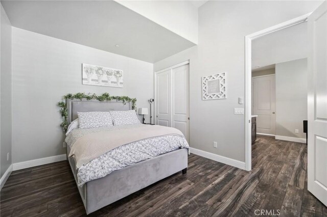 41908 Sonoma Rd, Palmdale, CA 93551 - bedroom with dark wood-style flooring and a closet