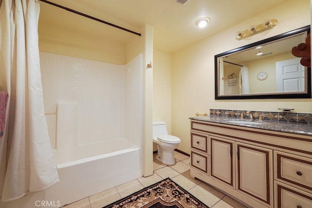 bathroom with shower / bath combo, visible vents, toilet, vanity, and tile patterned flooring