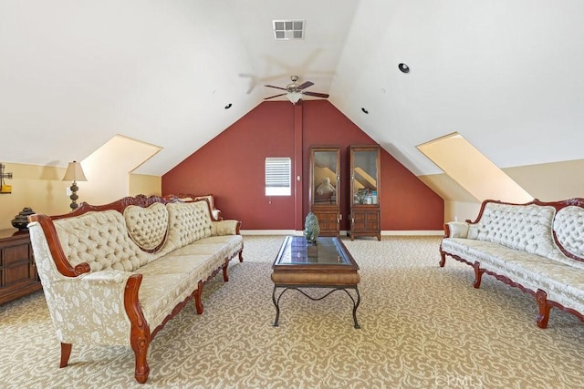 living room featuring visible vents, baseboards, a ceiling fan, carpet floors, and vaulted ceiling