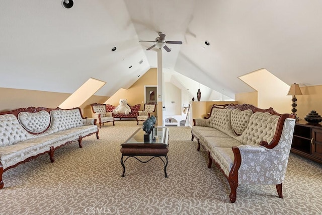living area featuring ceiling fan, vaulted ceiling, and carpet floors