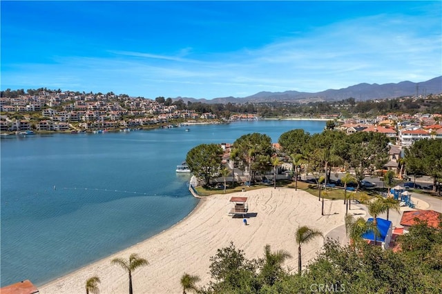 water view with a mountain view and a residential view