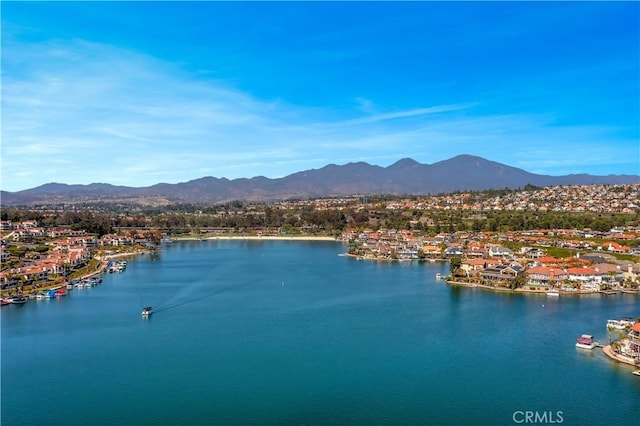 property view of water featuring a mountain view and a residential view