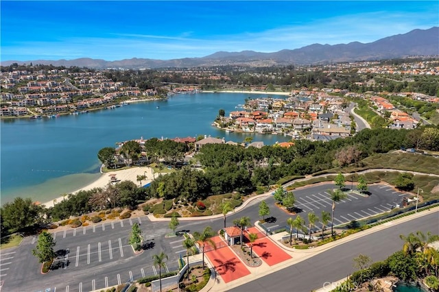 aerial view with a residential view and a water and mountain view