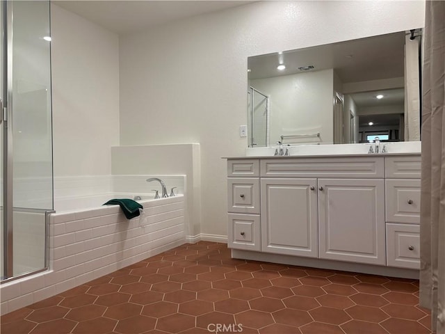 19427 Seeding Palace Cir, Riverside, CA 92507 - bathroom with a bath, a shower stall, vanity, and tile patterned flooring