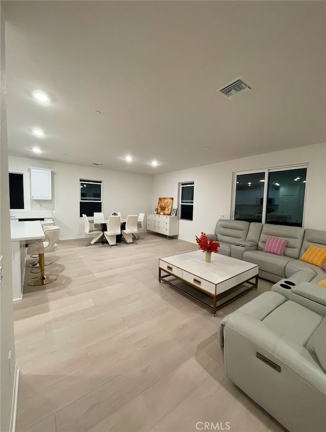 19427 Seeding Palace Cir, Riverside, CA 92507 - living room with recessed lighting and light wood finished floors