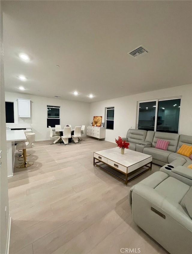 19427 Seeding Palace Cir, Riverside, CA 92507 - living area featuring recessed lighting and light wood finished floors