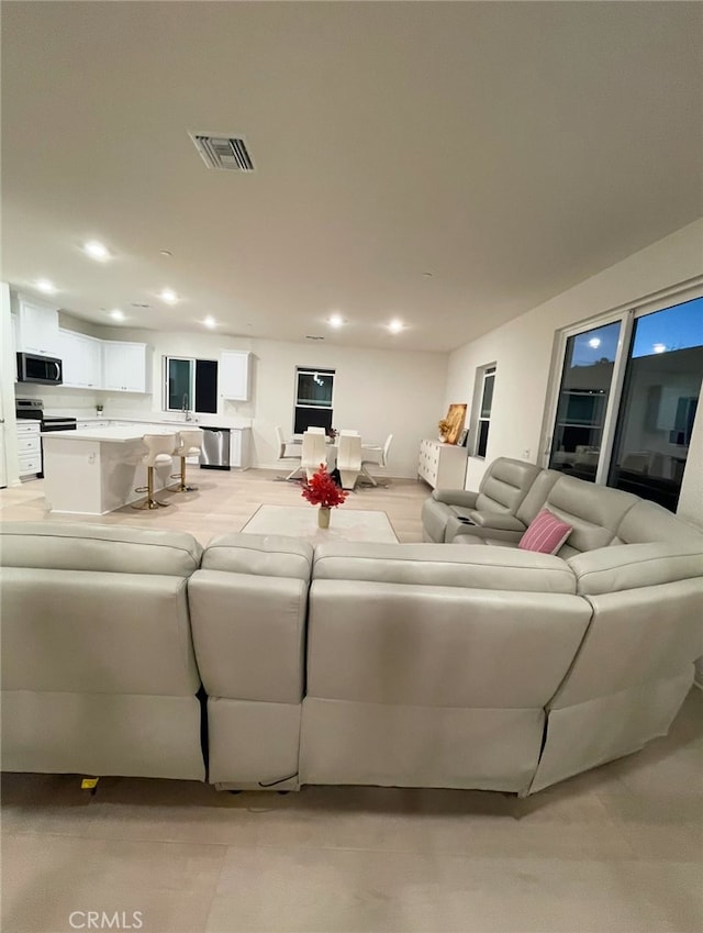 19427 Seeding Palace Cir, Riverside, CA 92507 - living room featuring recessed lighting