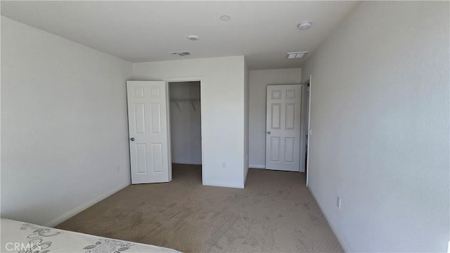 19427 Seeding Palace Cir, Riverside, CA 92507 - unfurnished bedroom featuring carpet flooring, baseboards, a closet, and a spacious closet