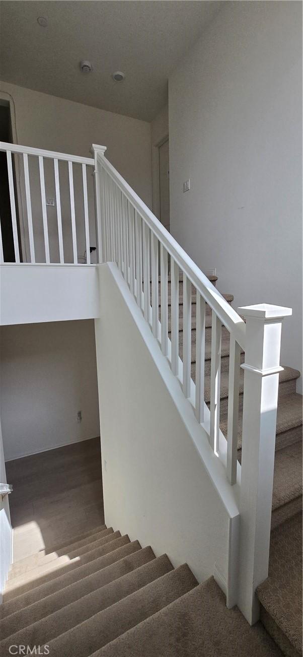 19427 Seeding Palace Cir, Riverside, CA 92507 - stairway with wood finished floors