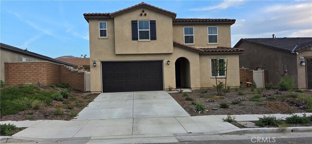19427 Seeding Palace Cir, Riverside, CA 92507 - view of front of property with stucco siding, a tile roof, driveway, and a garage